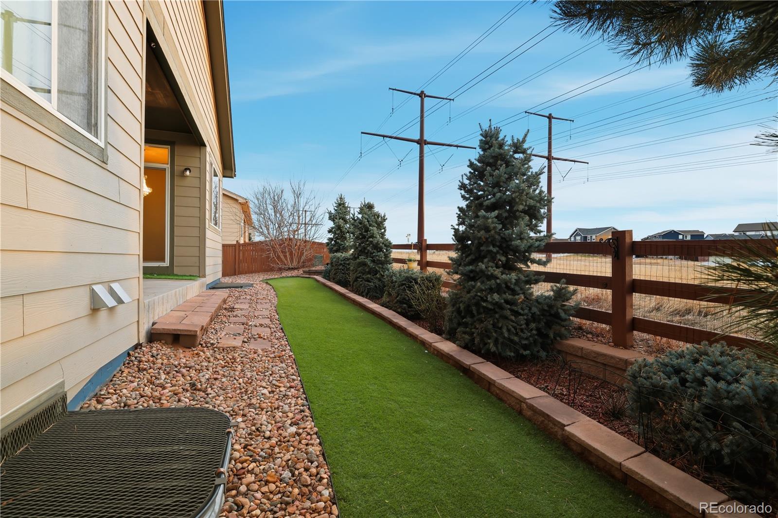 3932 Desert Ridge Circle Castle Rock, CO 80108 - Photo 33 of 49 a view of a backyard with chairs