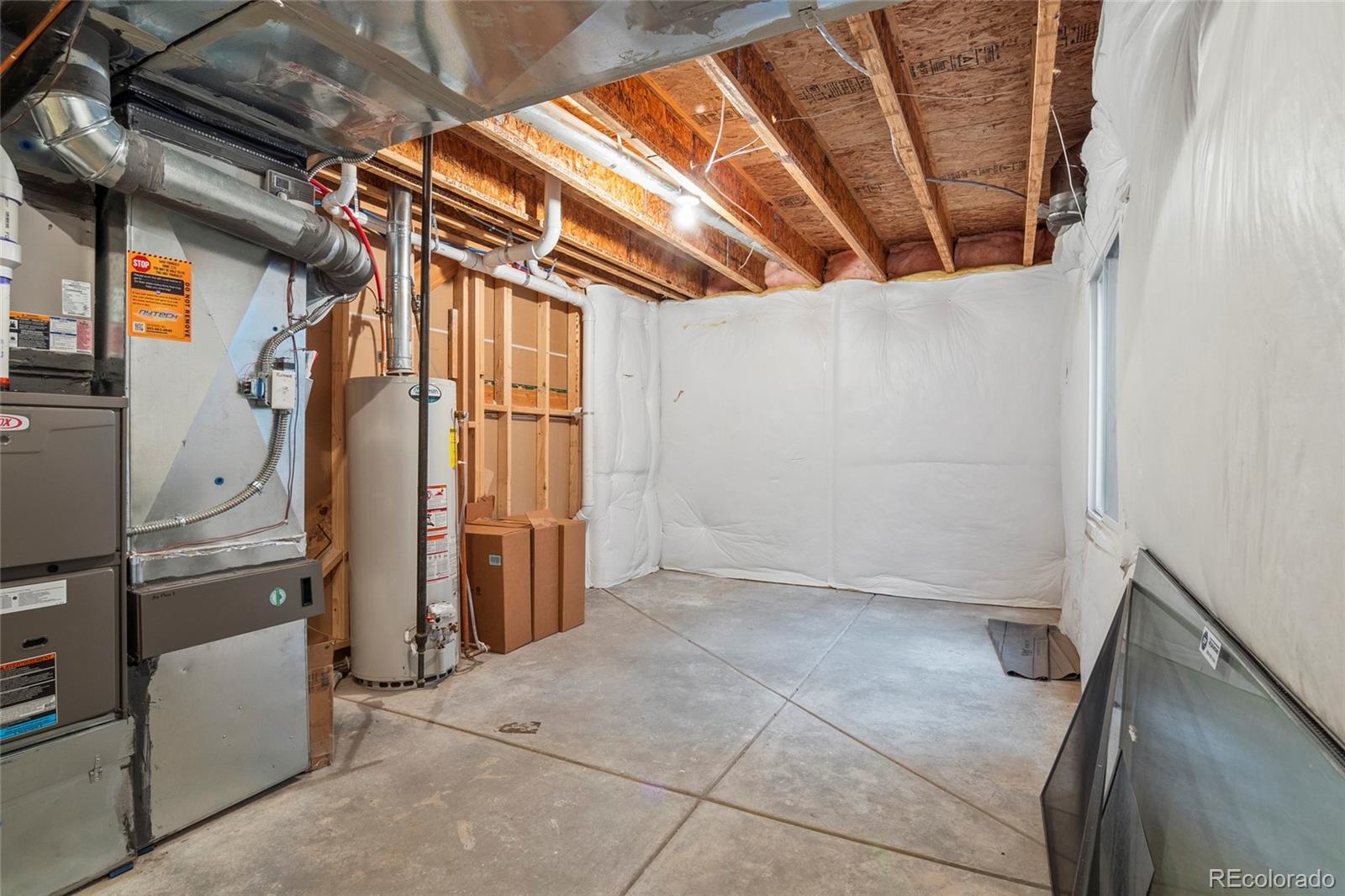 3932 Desert Ridge Circle Castle Rock, CO 80108 - Photo 39 of 49 a view of storage and utility room