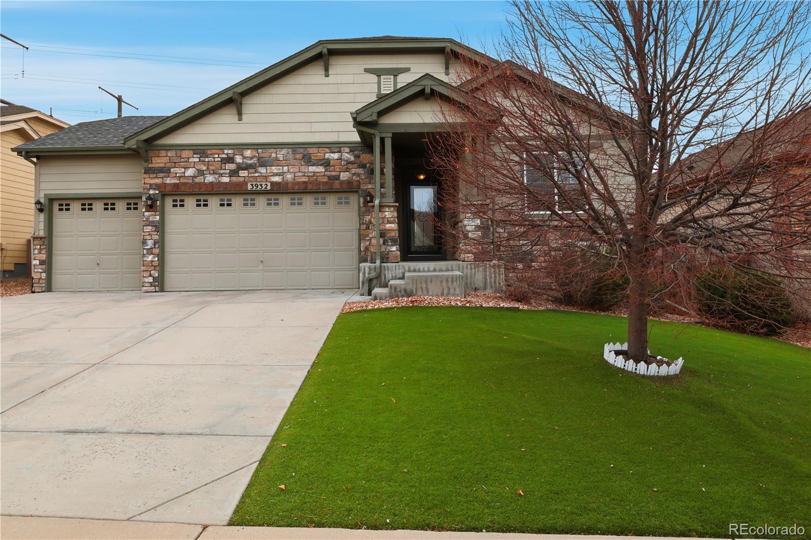 3932 Desert Ridge Circle Castle Rock, CO 80108 - Photo 4 of 49 a front view of house with yard and green space