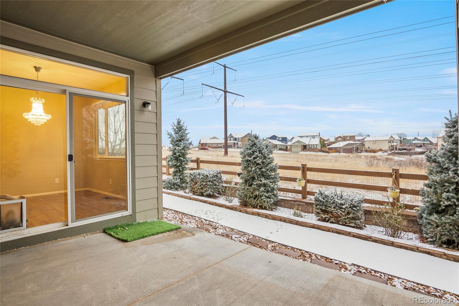 3932 Desert Ridge Circle Castle Rock, CO 80108 - Photo 45 of 49 a view of a pathway along a building