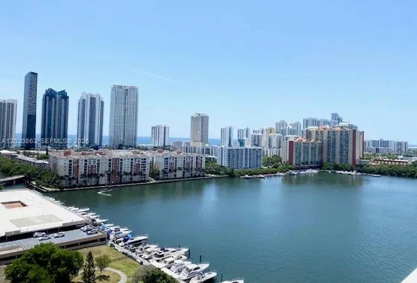 a view of a city with tall buildings