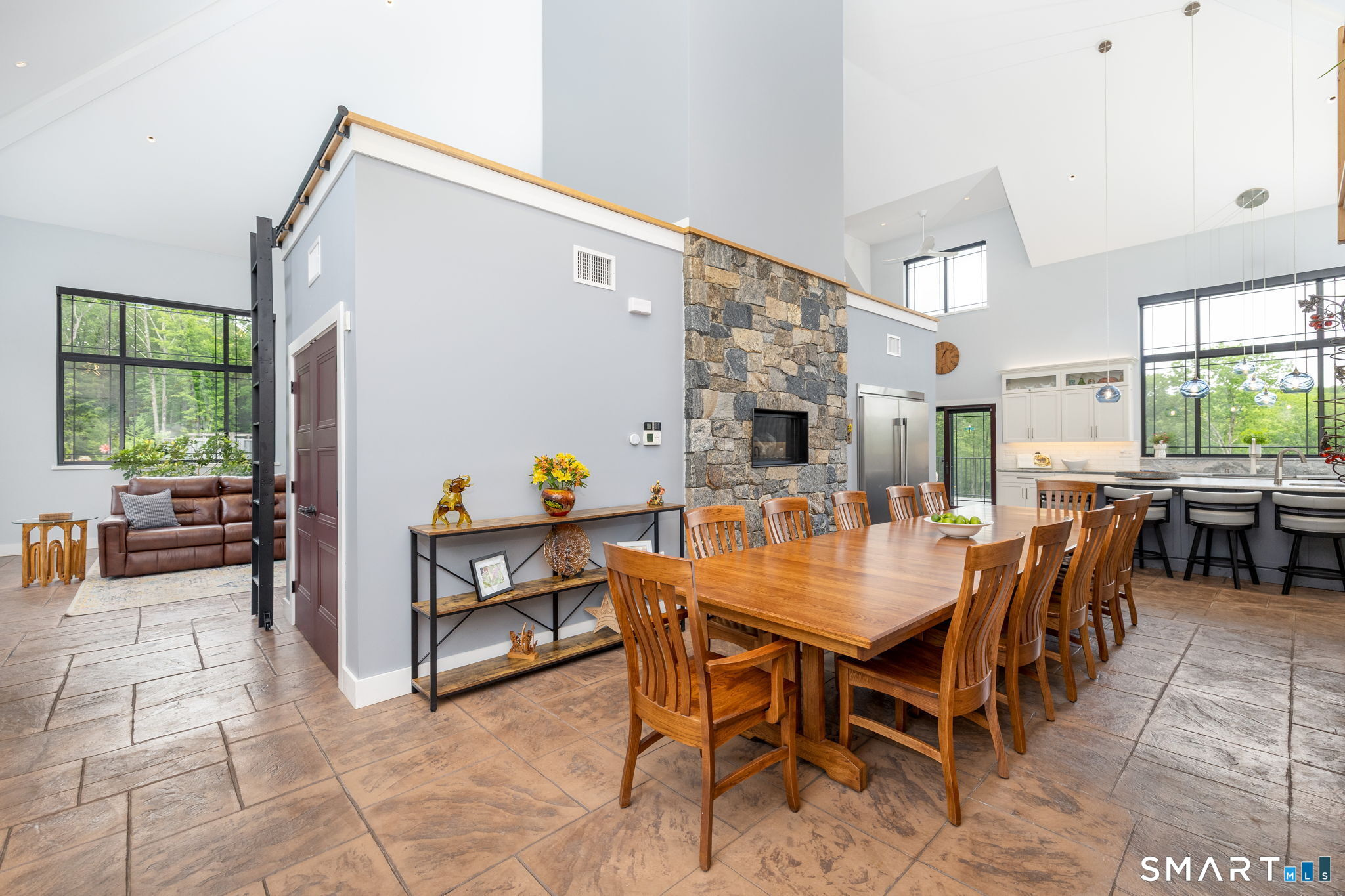 2540 Norfolk Road Torrington, CT 06790 - Photo 6 of 35 Stone gas fireplace and kitchen view