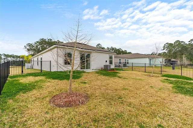 a view of a lake with a big yard