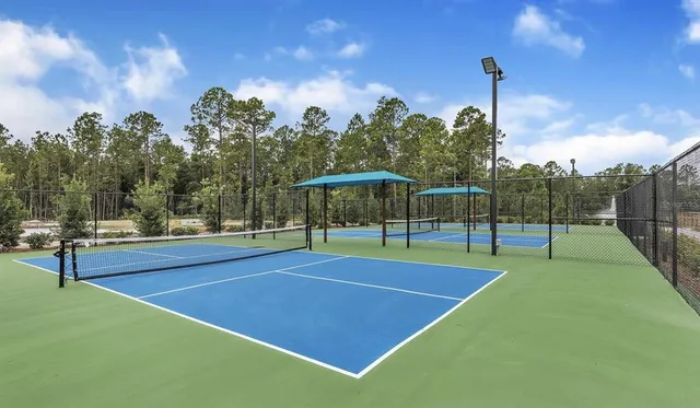 a view of a swimming pool with a patio