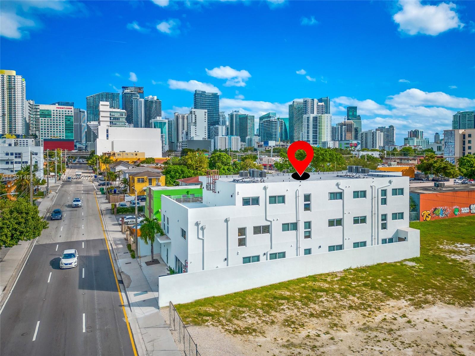 542 Southwest 7th Street Miami, FL 33130 - Photo 13 of 22 a view of a swimming pool with a patio