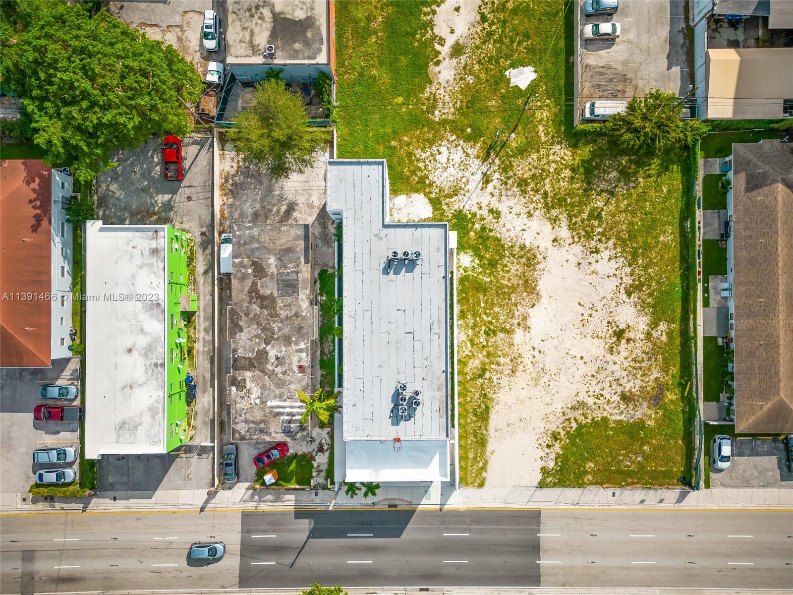 542 Southwest 7th Street Miami, FL 33130 - Photo 7 of 22 front view of a house with a tree and plants