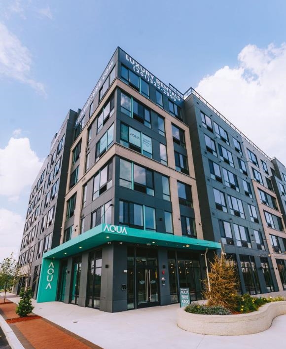 54 Flagship Street, Unit 421 Bayonne, NJ 07002 - Photo 13 of 16 a front view of a building