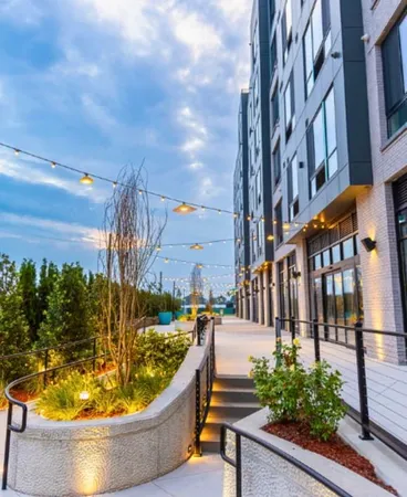 a view of a swimming pool with a lounge chairs