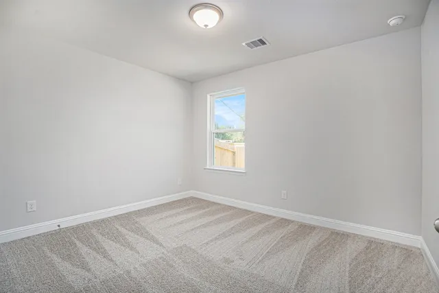 an empty room with a window