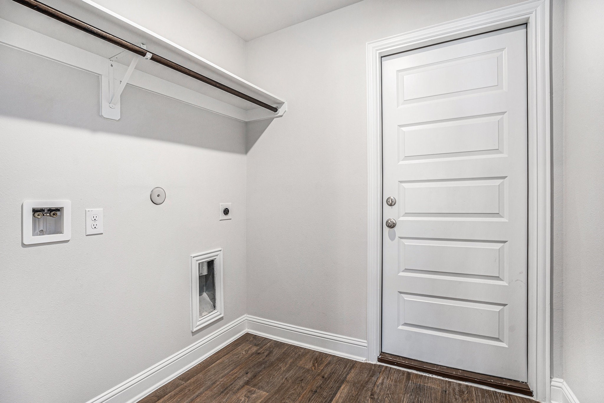 424 Bryan Street Angleton, TX 77515 - Photo 16 of 17 a view of walk in closet with empty racks
