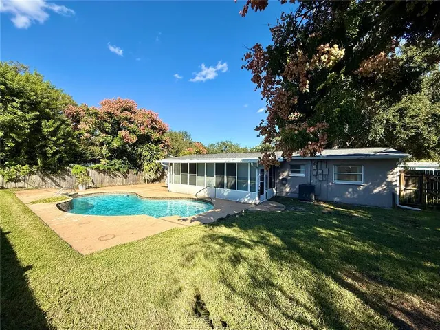 a view of a house with a big yard