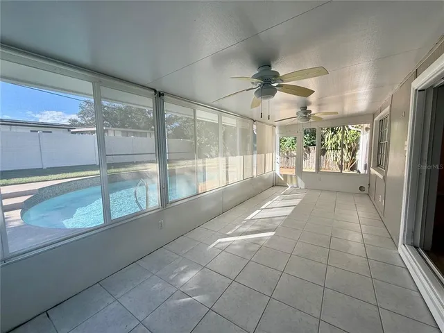 a view of entryway with a floor to ceiling window