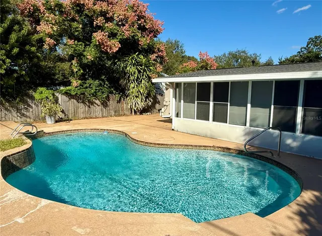 a house view with a swimming pool