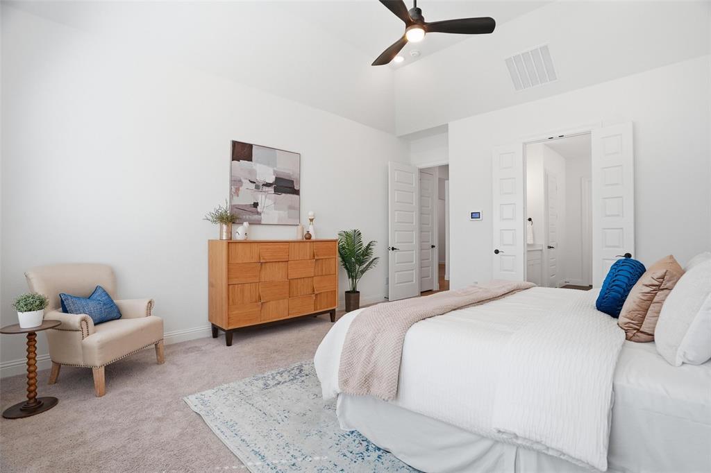 513 Fieldstone Lane Haslet, TX 76052 - Photo 21 of 39 a bedroom with a bed and wooden floor