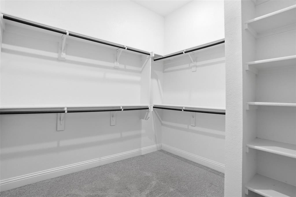 513 Fieldstone Lane Haslet, TX 76052 - Photo 25 of 39 a view of a walk in closet