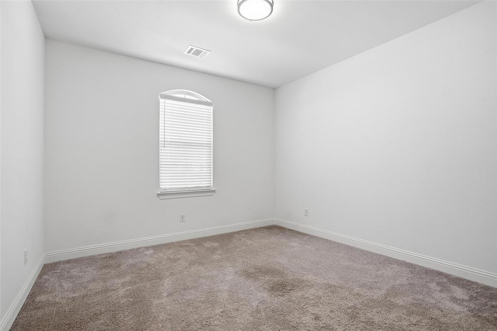 513 Fieldstone Lane Haslet, TX 76052 - Photo 28 of 39 an empty room with a window