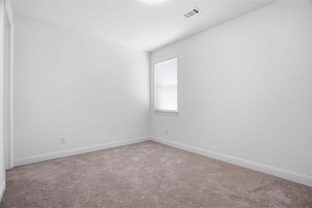 513 Fieldstone Lane Haslet, TX 76052 - Photo 30 of 39 an empty room with a window