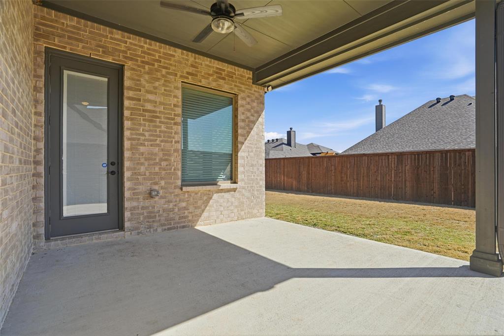 513 Fieldstone Lane Haslet, TX 76052 - Photo 32 of 39 a view of a backyard