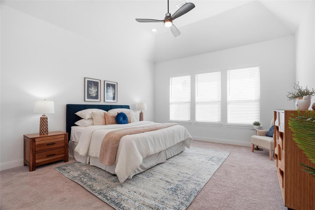 513 Fieldstone Lane Haslet, TX 76052 - Photo 6 of 39 a bed room with a bed and a tv