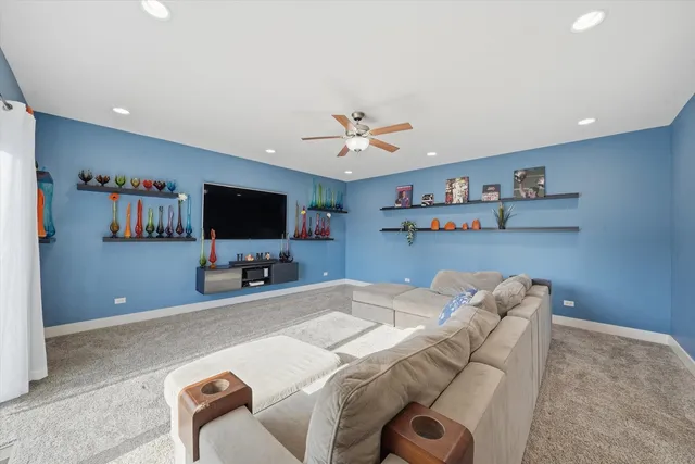 a bedroom with furniture and a flat screen tv