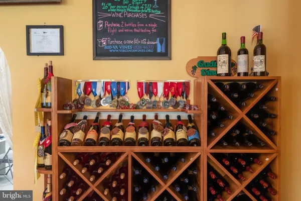 a room with lots of fruit and lots of shelves