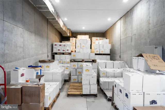 a view of a patio with a table and chairs