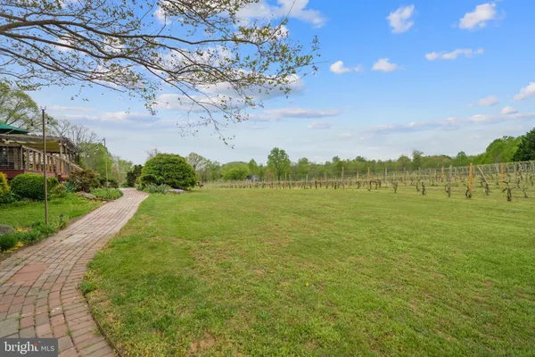 a view of a lake with a big yard