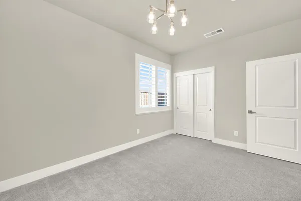 a view of a city with a lake