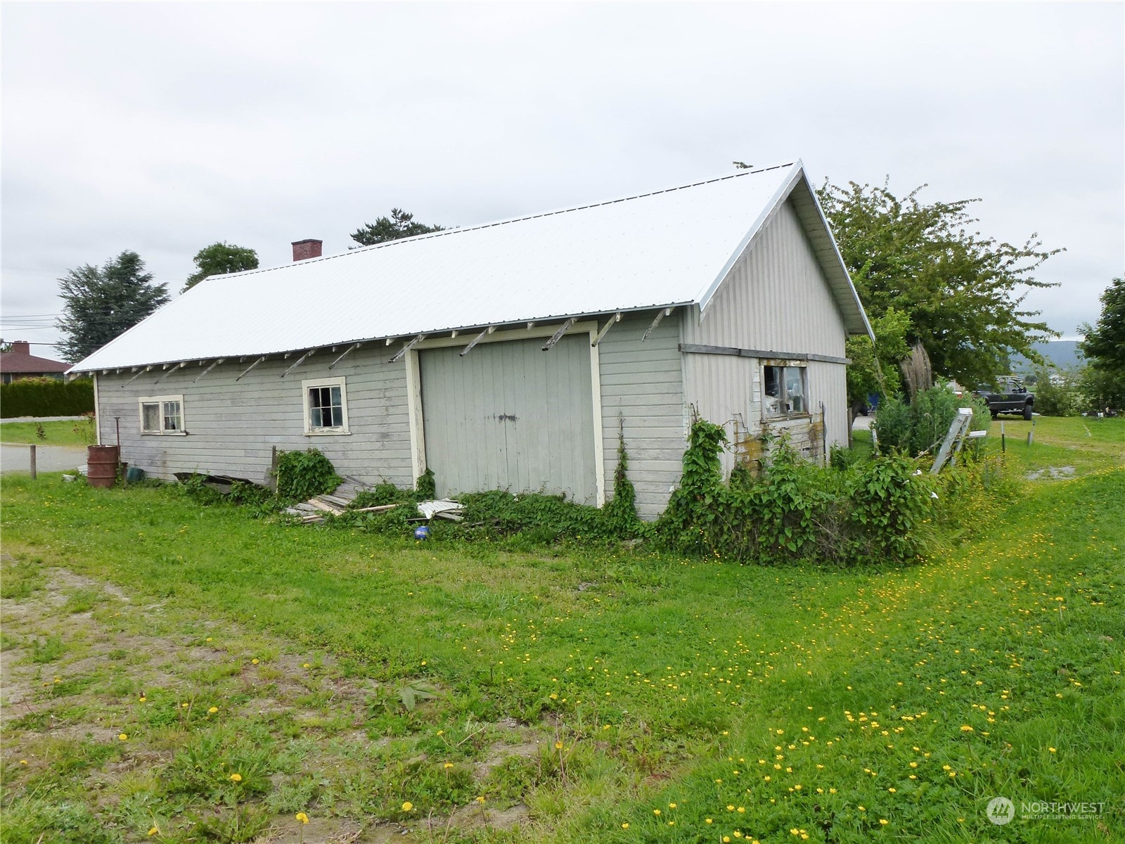 17096 Fir Island Road Mount Vernon, WA 98273 - Photo 5 of 22 a aerial view of a house with a yard