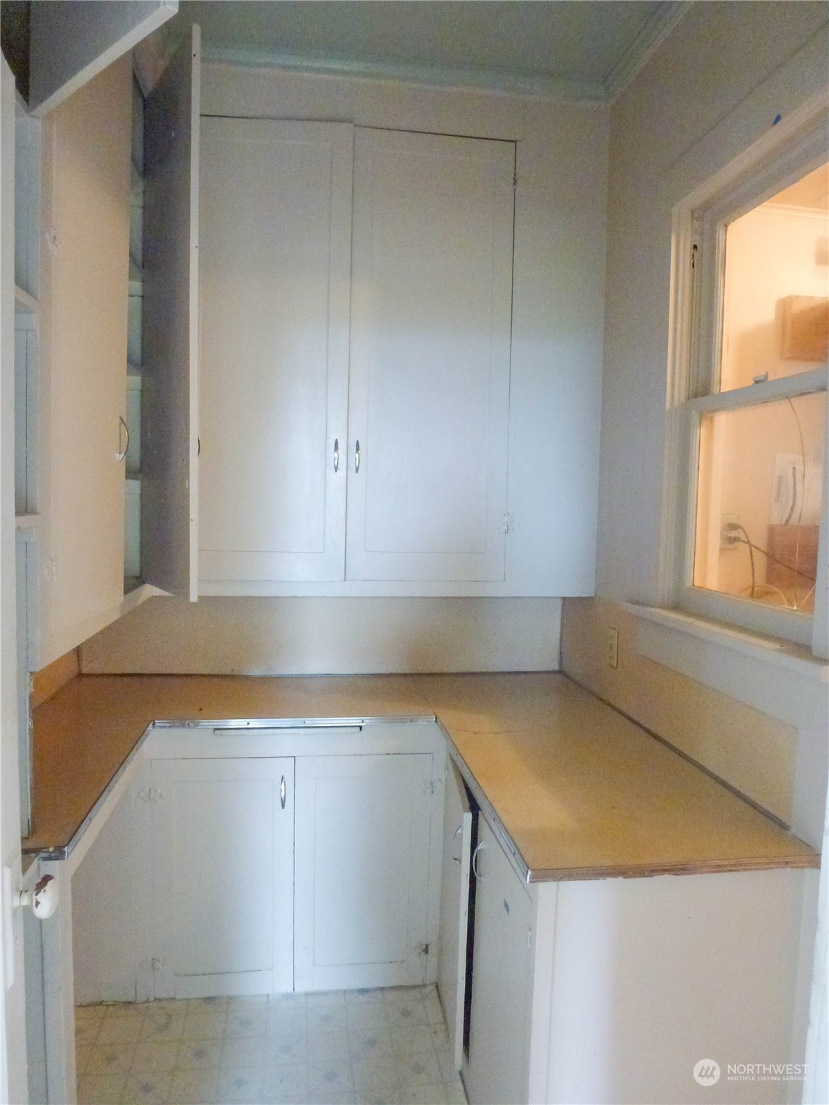 17096 Fir Island Road Mount Vernon, WA 98273 - Photo 8 of 22 a kitchen with a sink and a window