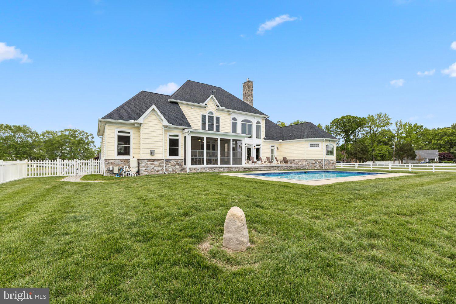 313 Wye Road Queenstown, MD 21658 - Photo 18 of 132 Charming home with pool and lush greenery.