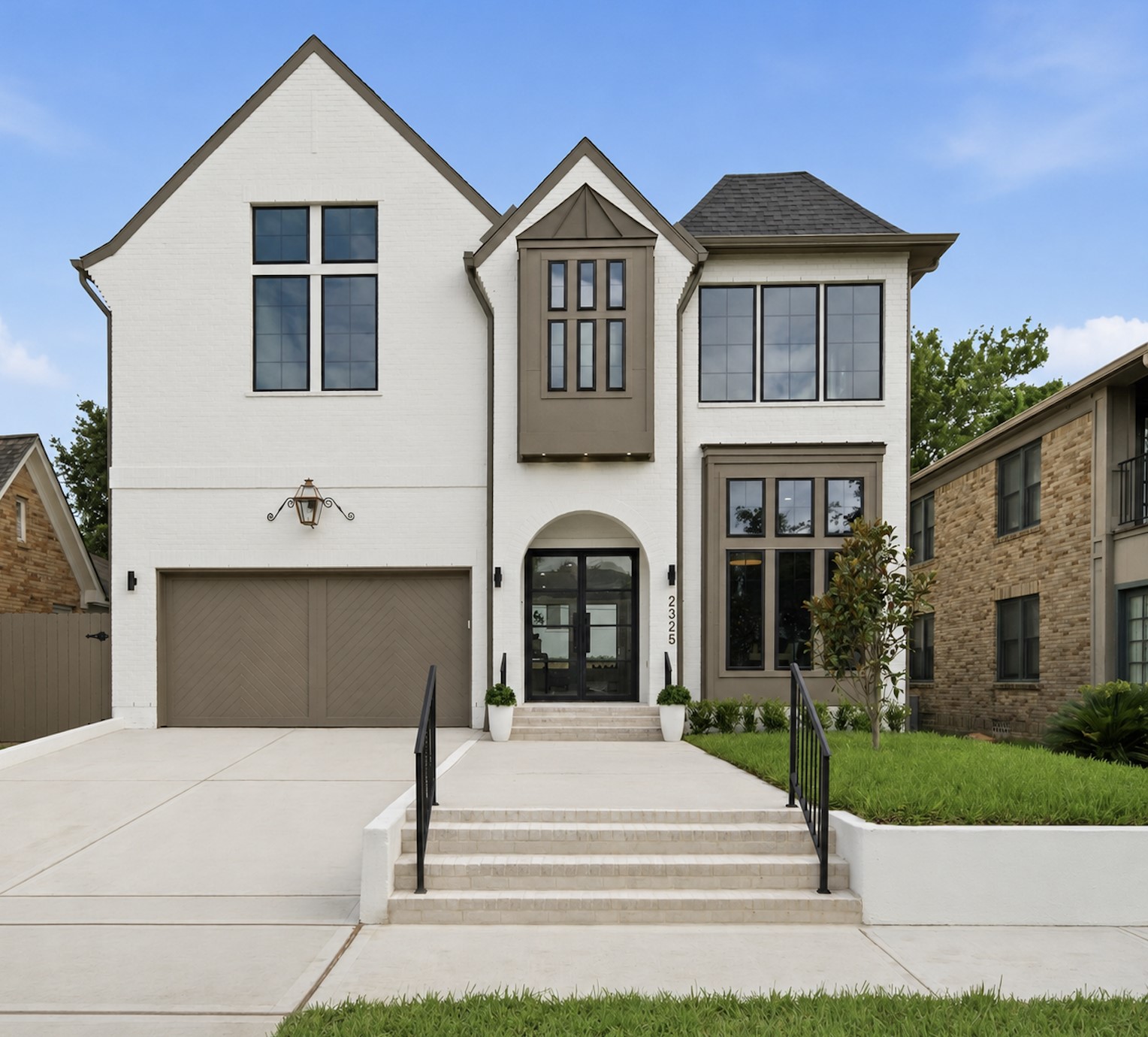 2325 Wroxton Road Houston, TX 77005 - Photo 1 of 31 Stunning Front Elevation with Grand Entrance, Retaining Wall and Oversized Gas Lamp