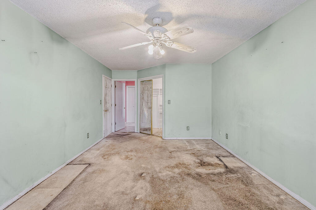 53 4th Street Shalimar, FL 32579 - Photo 25 of 47 wooden floor in an empty room