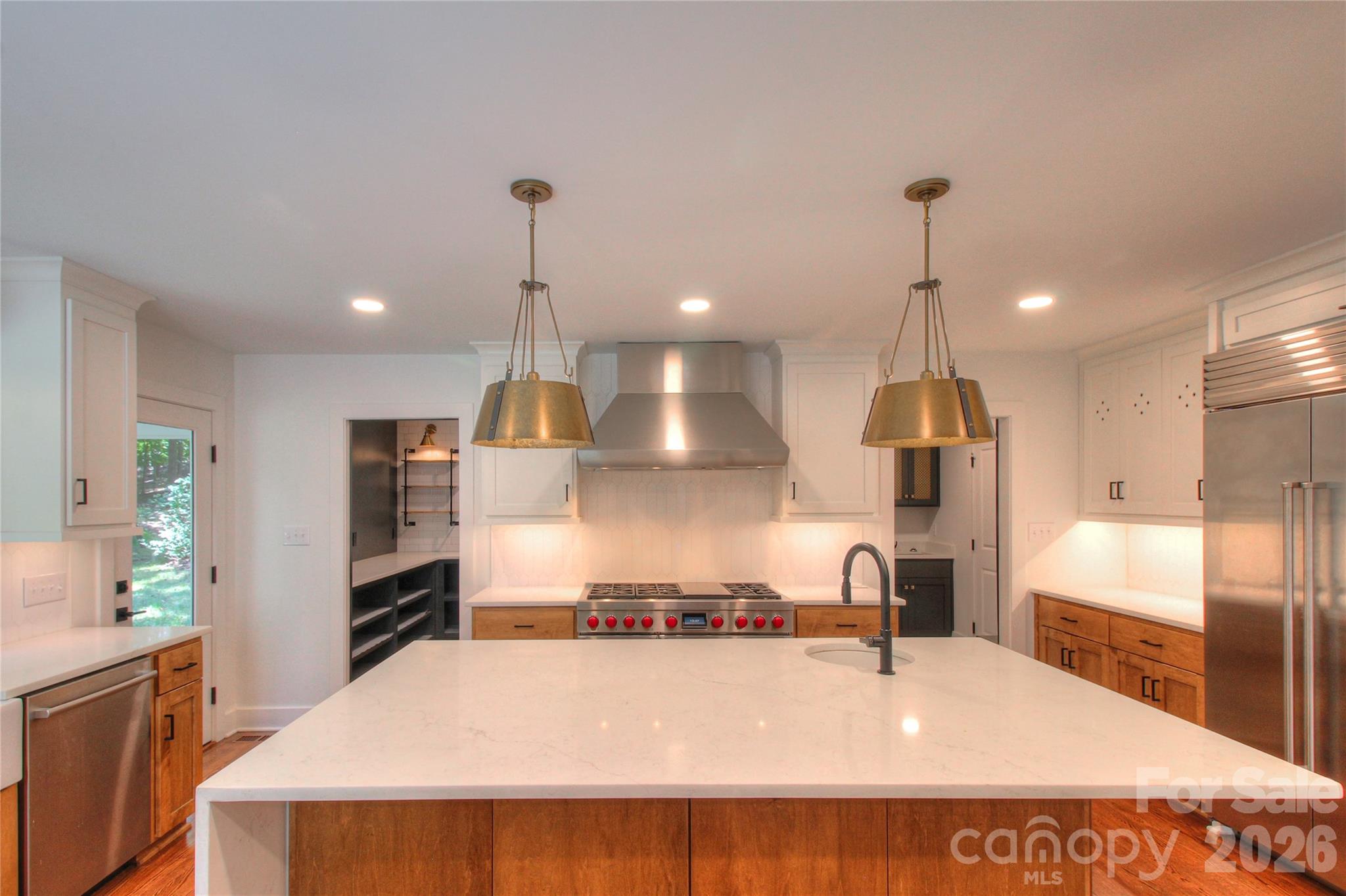 3408 Providence Manor Road Charlotte, NC 28270 - Photo 10 of 39 a large kitchen with a table and chairs