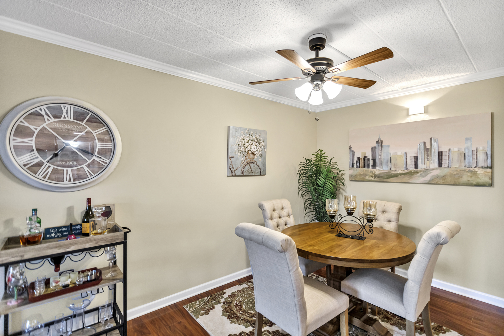 110 West Butterfield Road, Unit 507S Elmhurst, IL 60126 - Photo 5 of 12 a view of a dining room with furniture and a chandelier fan