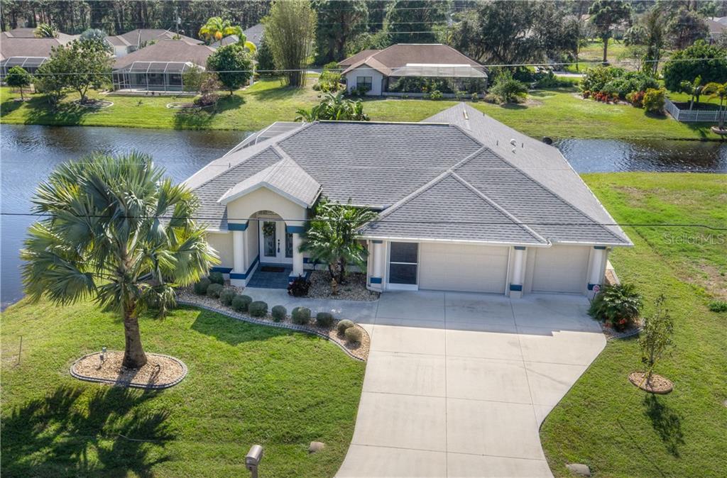 Beautiful & spacious home in Rotonda!  Waterfront, 4 bedrooms, 3 baths, pool & 3 car garage.  A must see!!