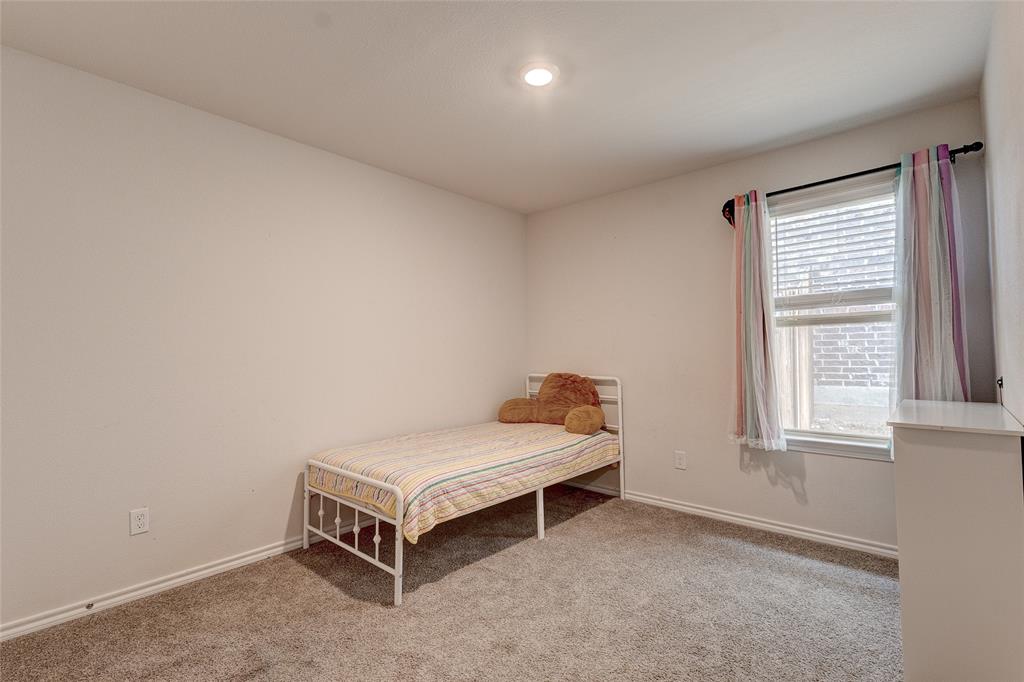 1016 Rio Bravo Drive Forney, TX 75126 - Photo 14 of 25 Bright room featuring neutral wall paint, recessed lighting, a window with blinds, and carpeted flooring