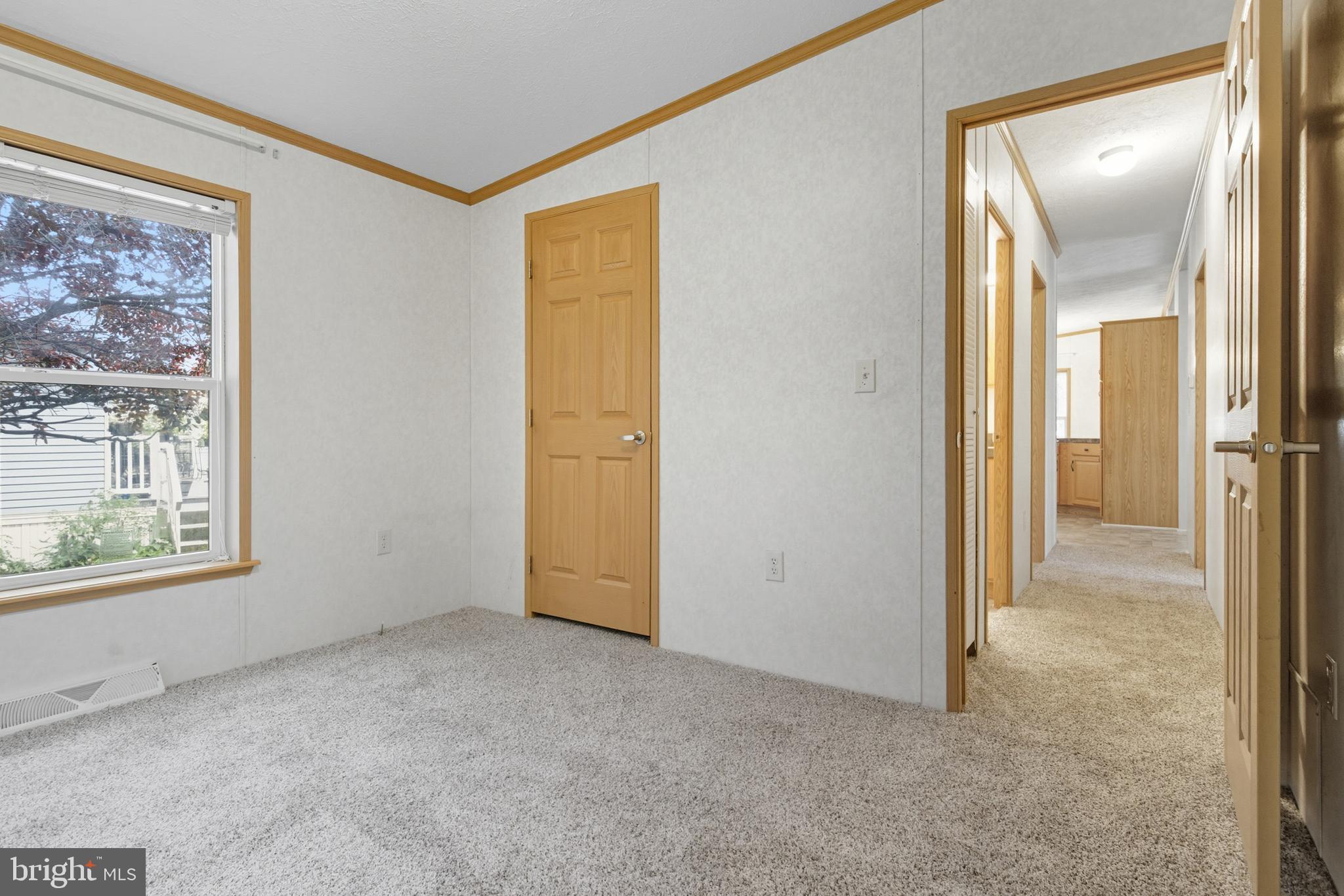 800 York Road, Unit 290 Dover, PA 17315 - Photo 13 of 23 a view of an empty room with a window