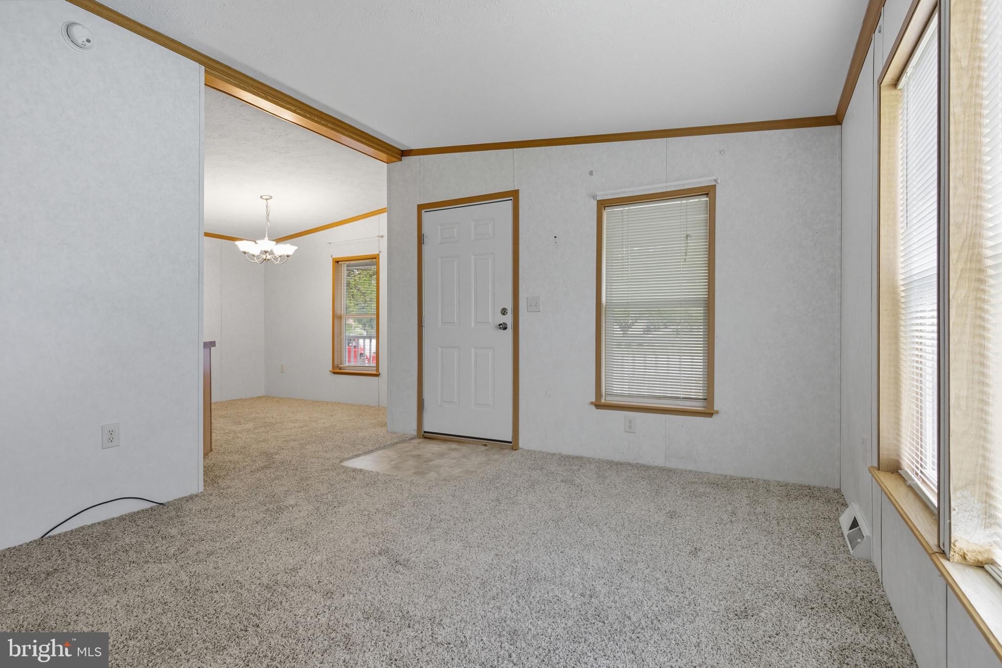 800 York Road, Unit 290 Dover, PA 17315 - Photo 14 of 23 an empty room with windows and closet