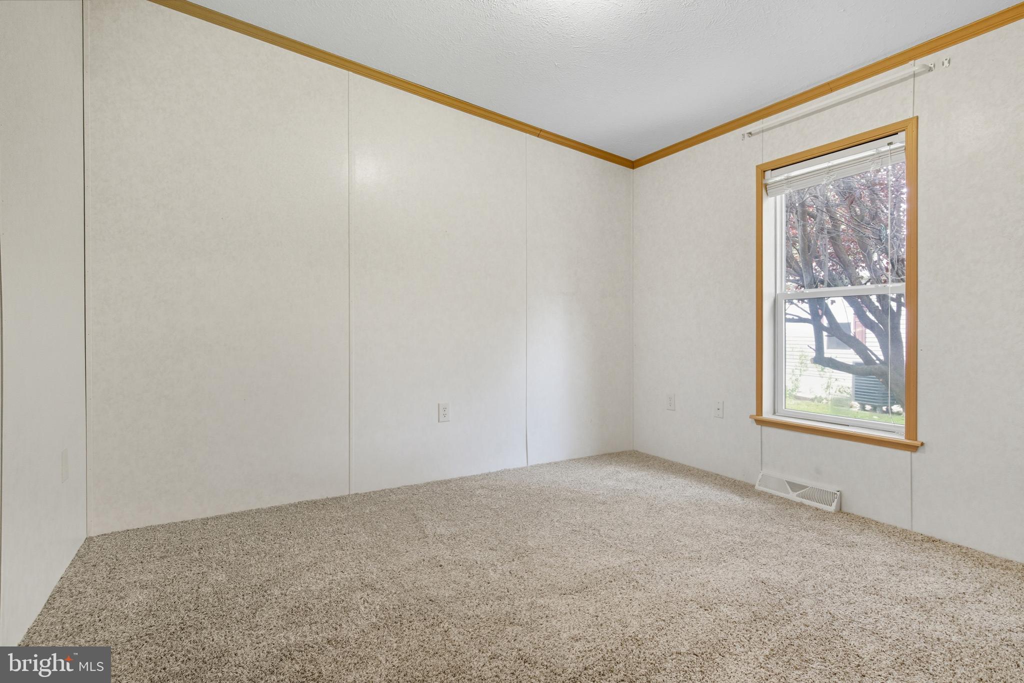 800 York Road, Unit 290 Dover, PA 17315 - Photo 18 of 23 an empty room with windows