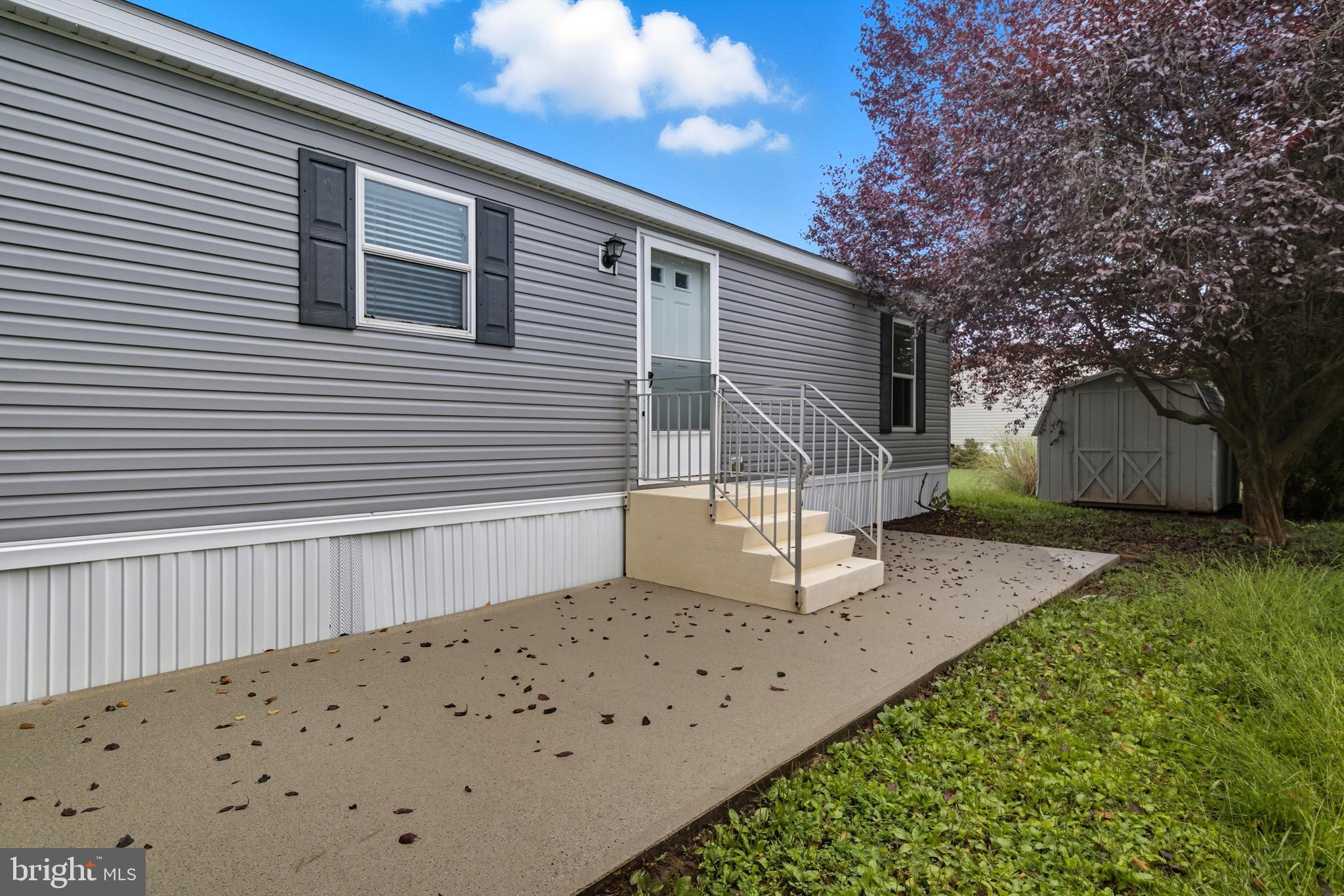 800 York Road, Unit 290 Dover, PA 17315 - Photo 7 of 23 a view of a house with a yard