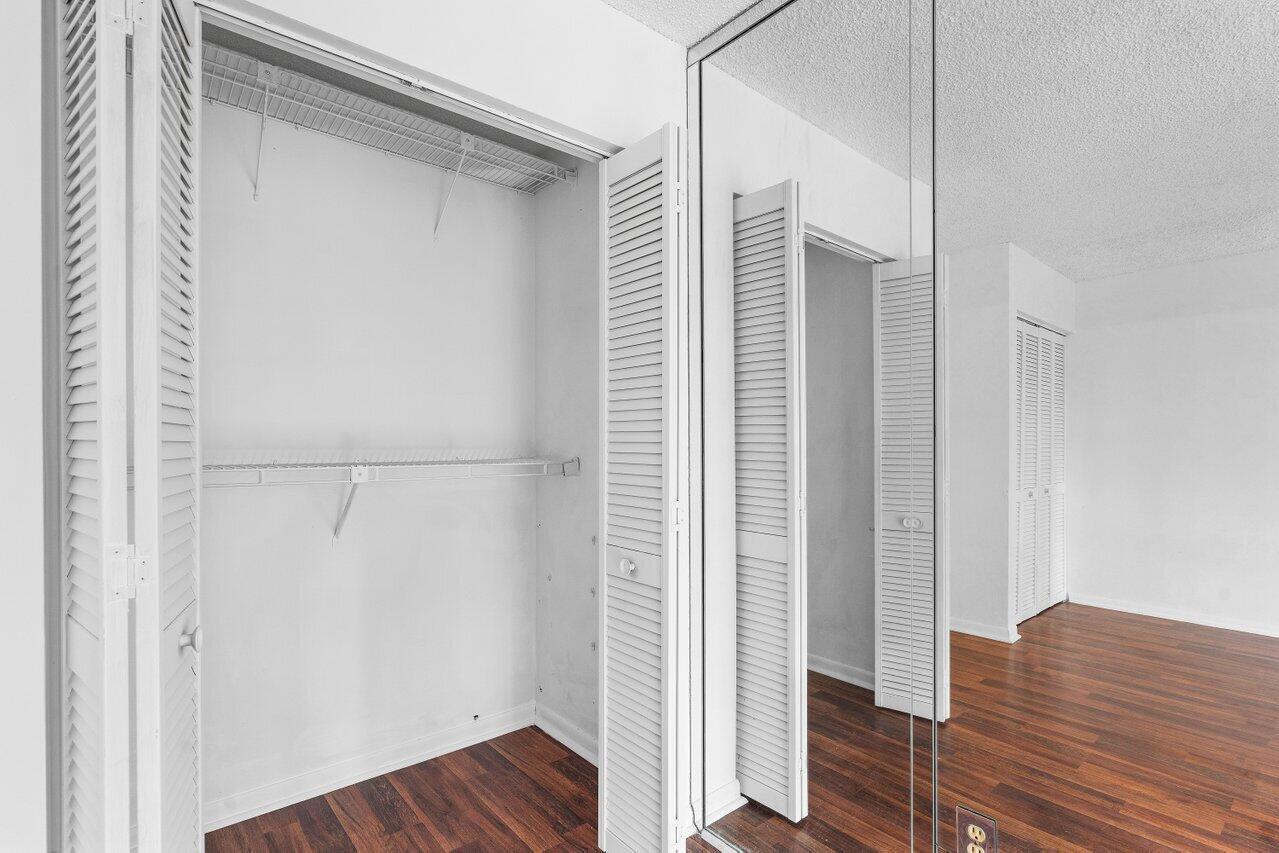 21648 Cypress Road, Unit 13E Boca Raton, FL 33433 - Photo 28 of 57 Master Bedroom Closet