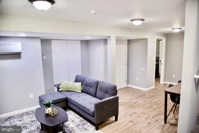 a living room with furniture and a couch