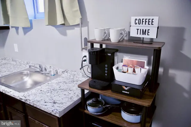 a room with table and chairs