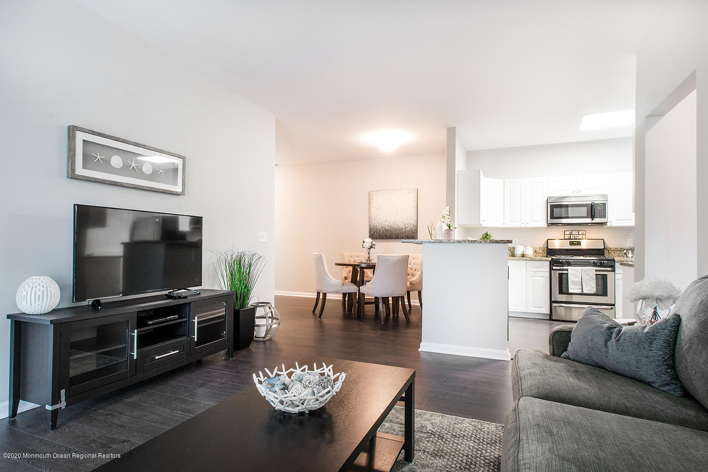 435 Timber Ridge Court Neptune Township, NJ 07753 - Photo 11 of 26 a living room with furniture and a flat screen tv