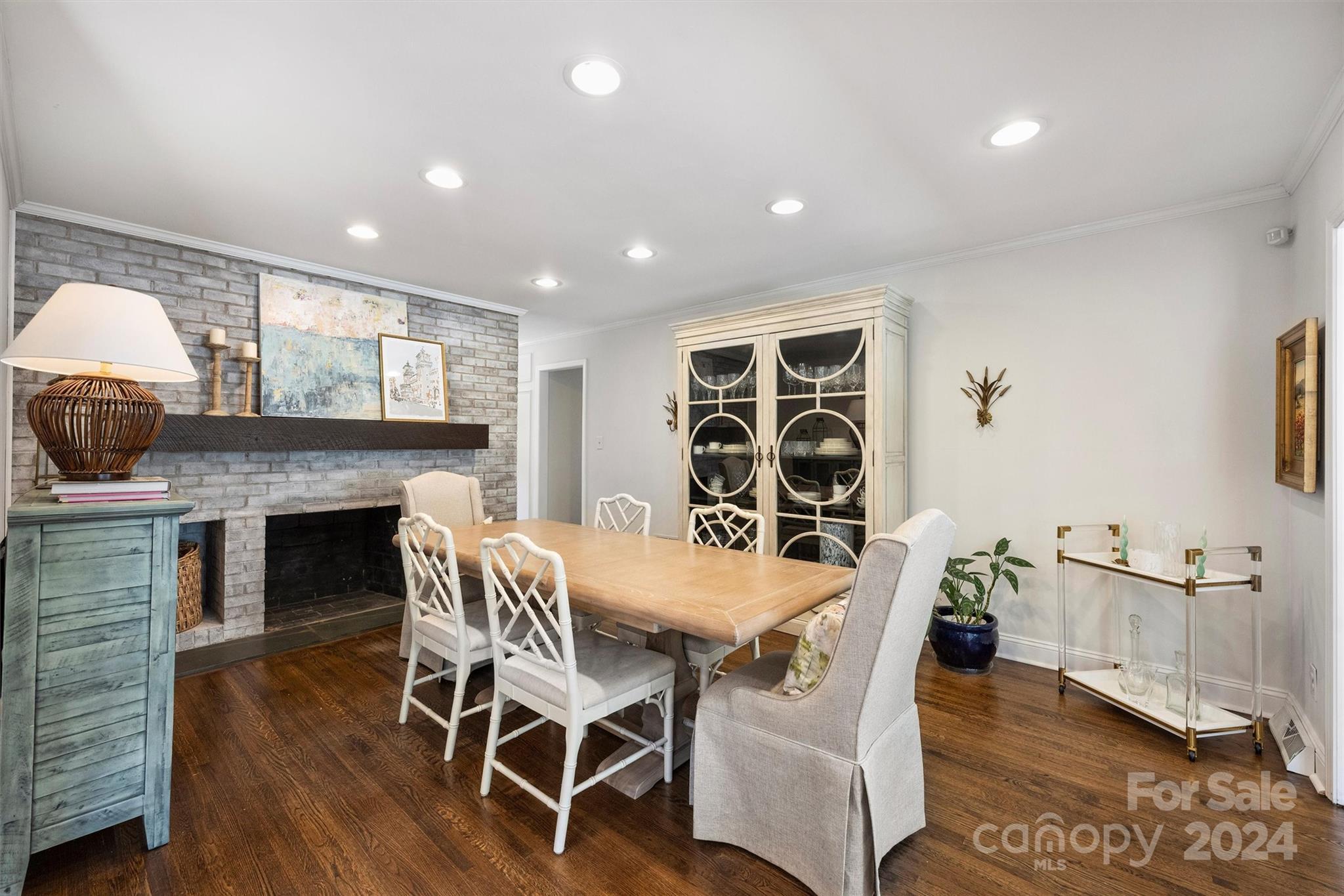 4115 Sulkirk Road Charlotte, NC 28210 - Photo 17 of 39 a view of a dining room with furniture and wooden floor