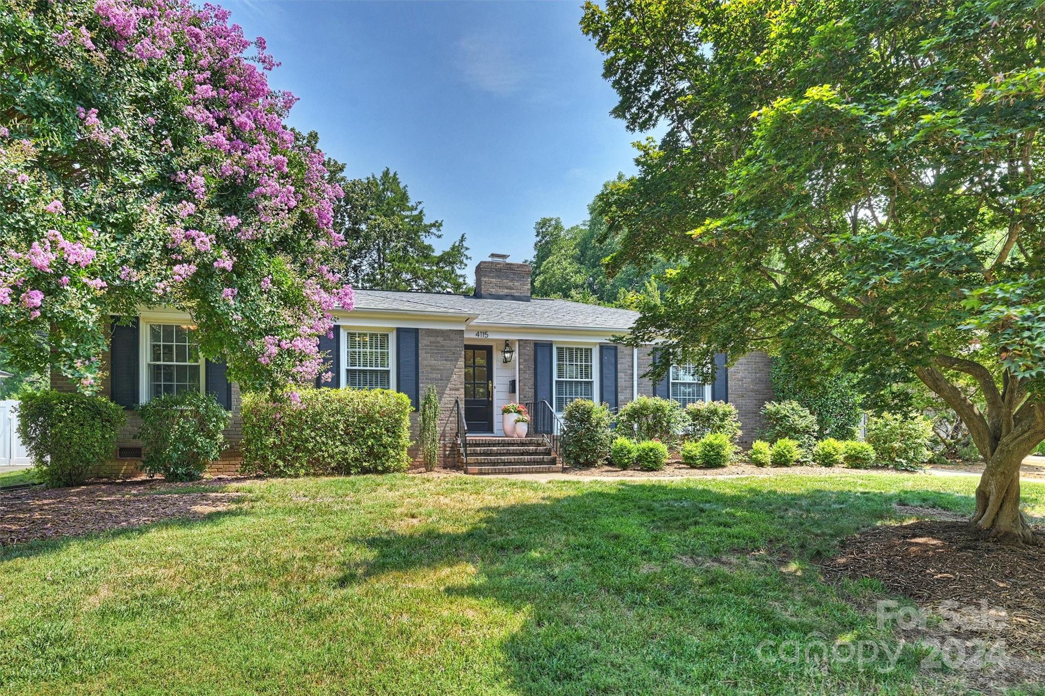 4115 Sulkirk Road Charlotte, NC 28210 - Photo 2 of 39 a front view of house with yard and green space
