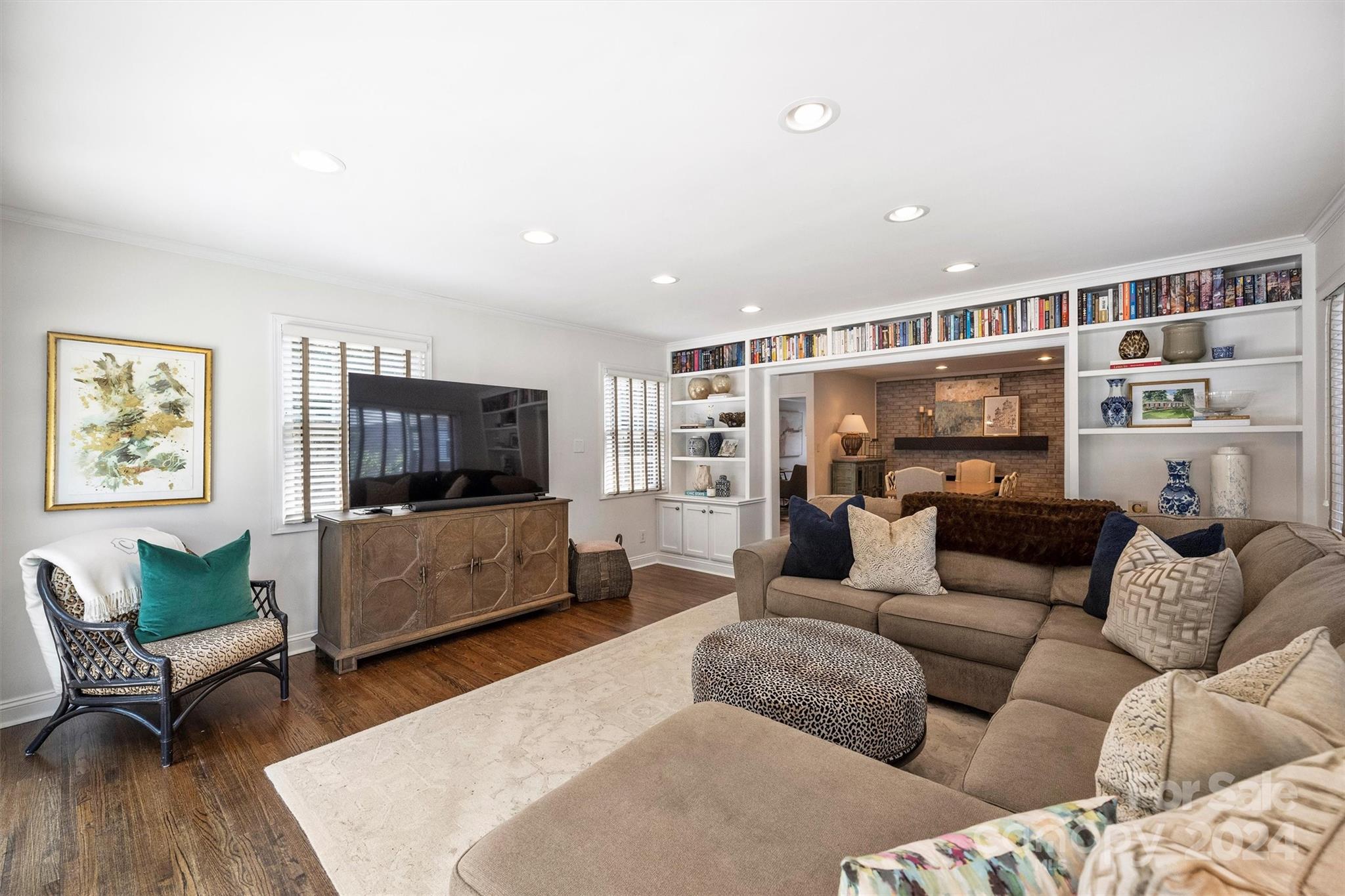 4115 Sulkirk Road Charlotte, NC 28210 - Photo 21 of 39 a living room with furniture and a flat screen tv
