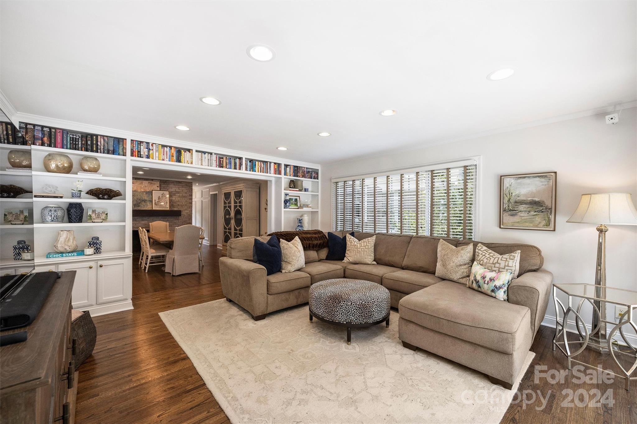 4115 Sulkirk Road Charlotte, NC 28210 - Photo 22 of 39 a living room with furniture and wooden floor