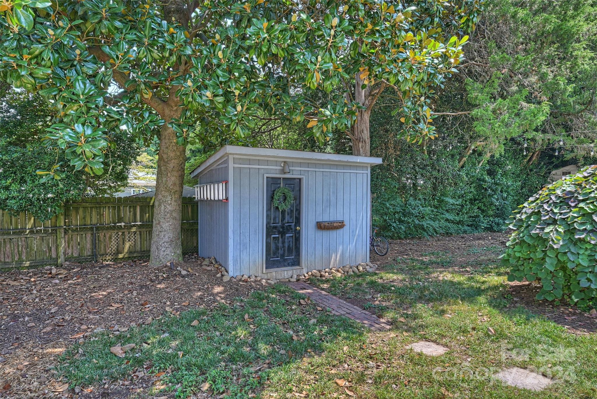 4115 Sulkirk Road Charlotte, NC 28210 - Photo 33 of 39 a view of a house with backyard and garden